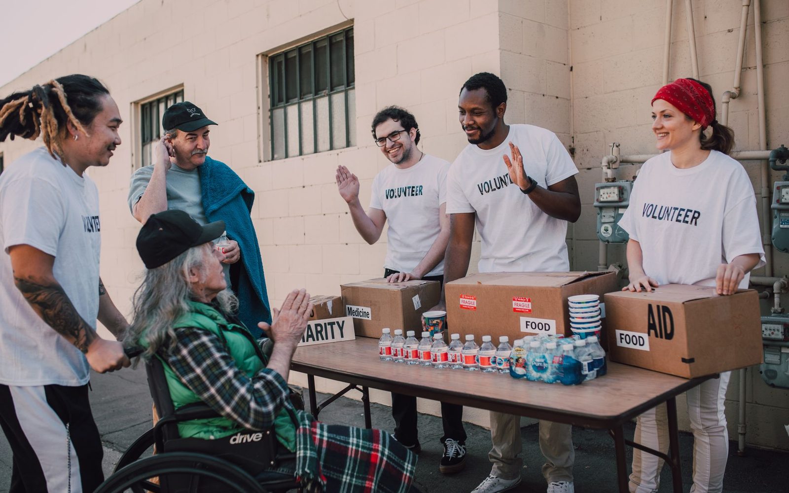 Volunteers running a community table