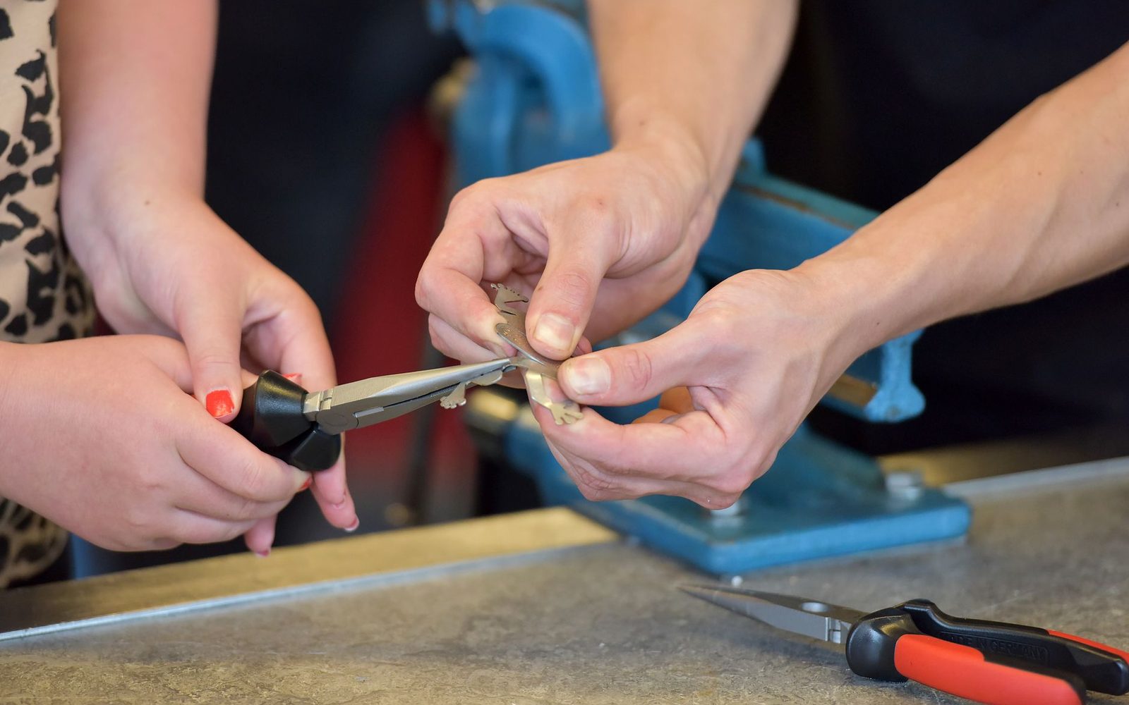 Hands at work in a training workshop