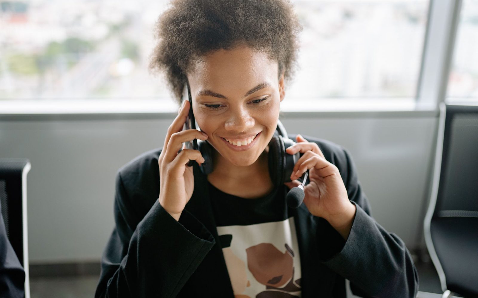 A staff member taking a call at the office