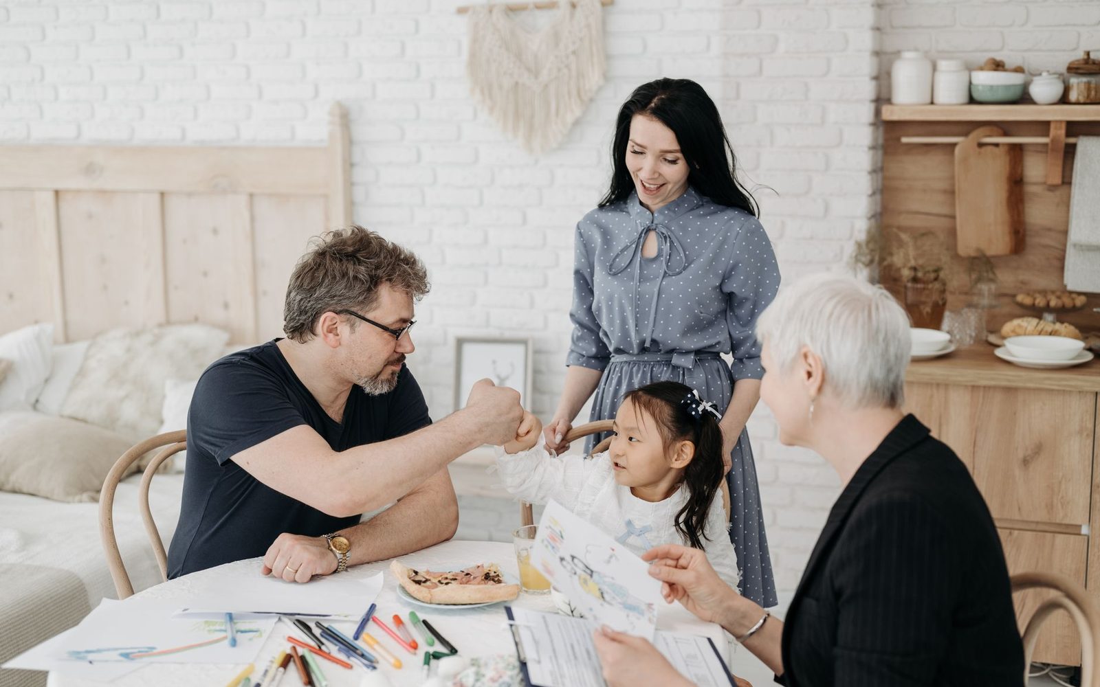 A family meeting with a worker indoors